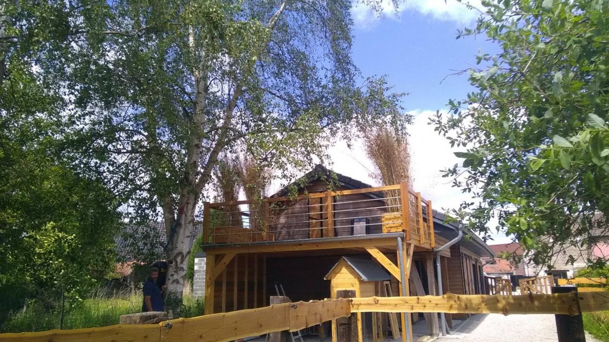 Hasnon Cottage | Wooden Chalet with Private Garden, Hot Tub, and Parking in Charming Village