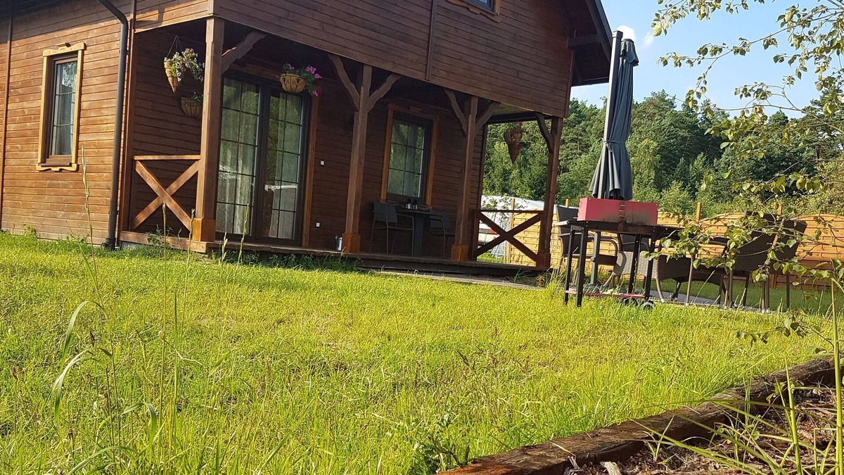 gmina Osiek House | Wooden Holiday Home in Skrzynia with Terrace
