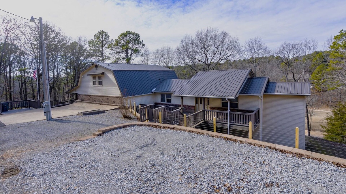Kansas House | Woodland Escape, A rustic Charm meets Modern comfort in this 2BR 2BA home.