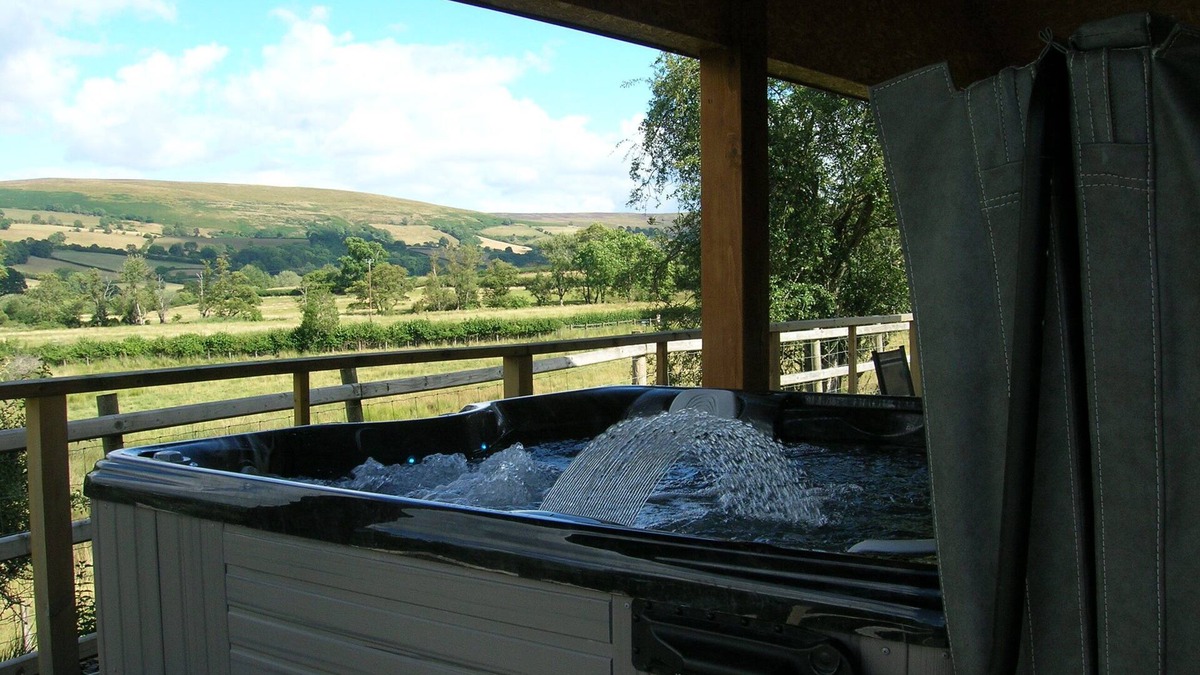 Hundred House Cabin | Woodland Lodge - A Five star luxury lodge with hot tub under cover.