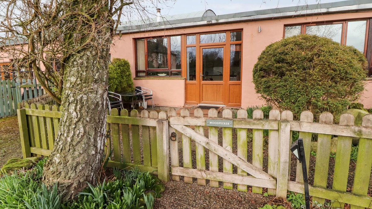 Ivegill Cottage | WOODPECKER, pet friendly, with open fire in High Head Castle Farm