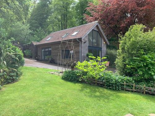 Cleeve House | Woodside Lodge, surrounded by woodland and beautiful gardens