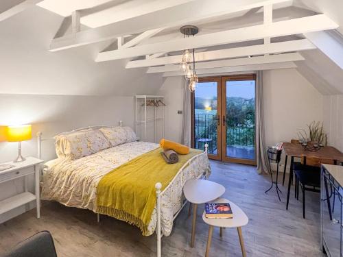 Rusper House | Wysteria, North Lodge