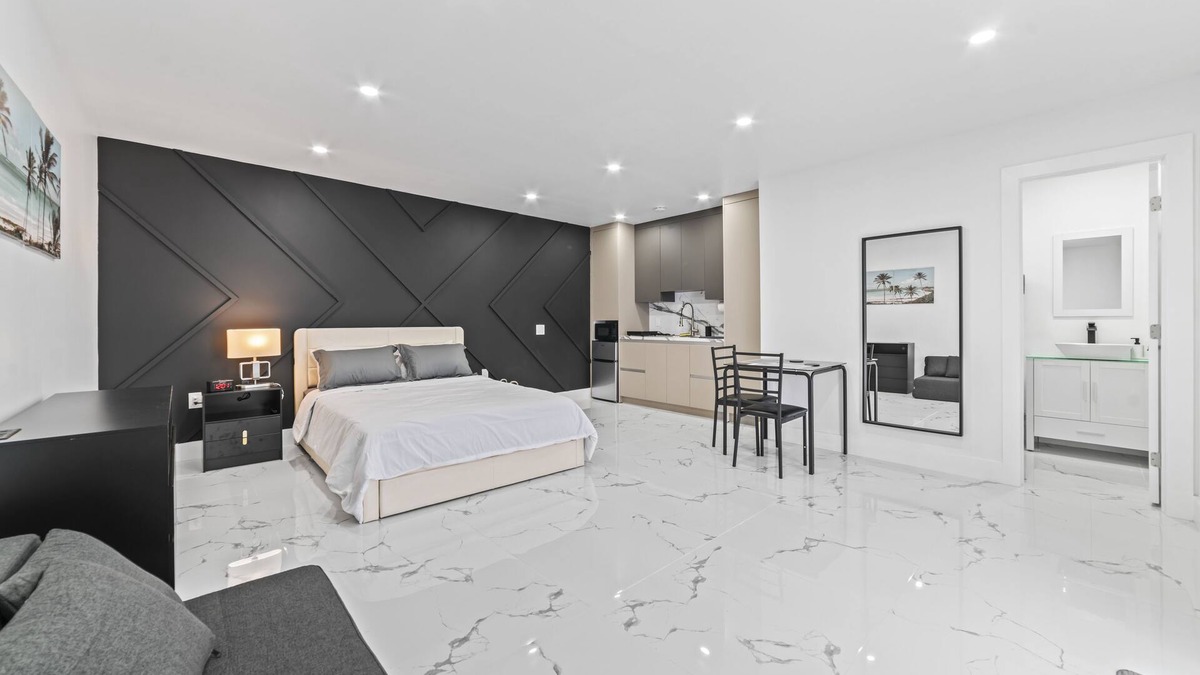 Richmond West Apartment | XL Luxury Room. Luxurious studio retreat with sleek designs.