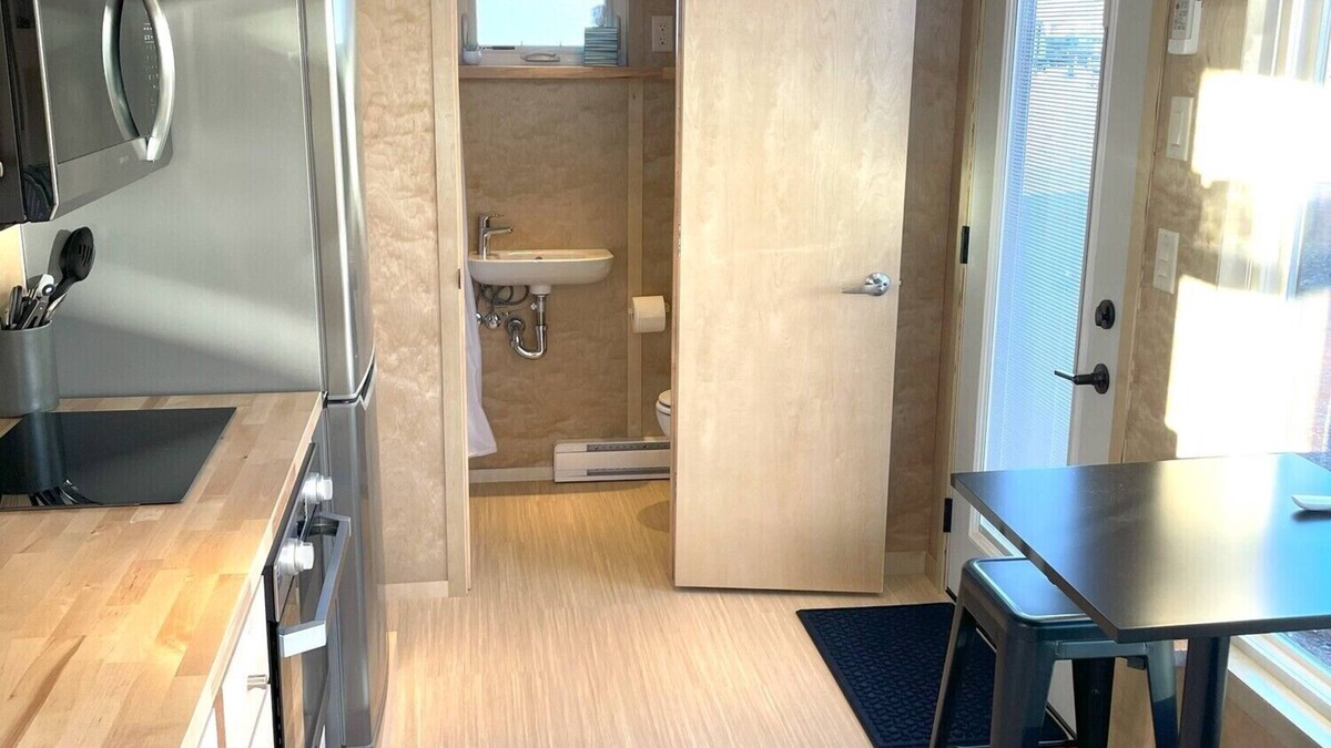 Pear Park House | XL tiny home with two lofted queen beds and full size futon on the main level.