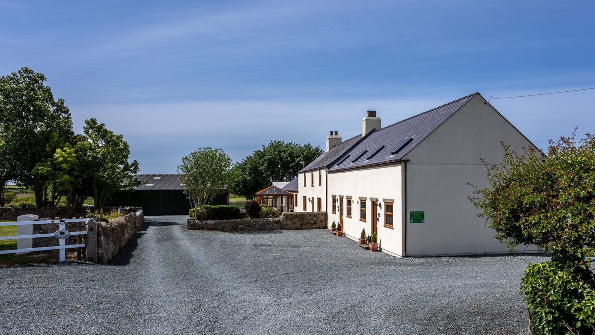 Llanfaelog House | Y Stabl: Pet-friendly cottage with stunning views