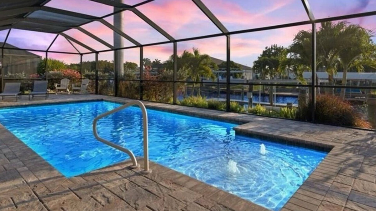 Yacht Club House | Yacht club area of Cape Coral w/Saltwater Pool, Dock & Theater Room