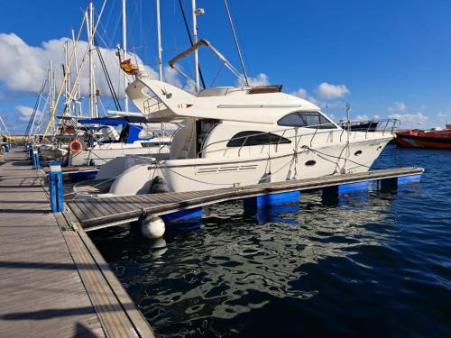 Santa Cruz de Tenerife Boat Rental | Yacht Experience Tenerife 24h plus Tour with private Skipper & private Hostess all inclusive with Cocktails, Sandwiches and free Minibar