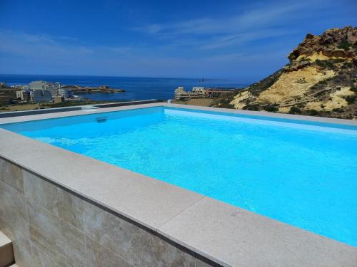 Marsalforn Apartment | Yellow Hill Penthouse