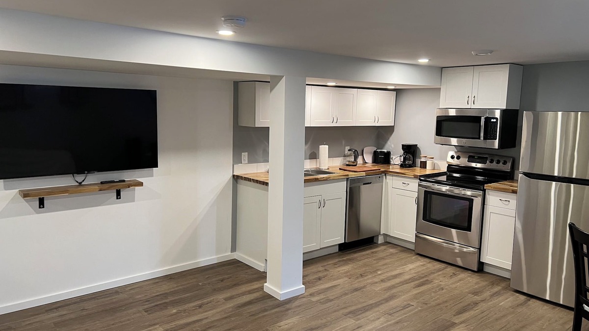 Trail Apartment | Your private suite awaits.Half a block from Gryro park. Quite safe area!