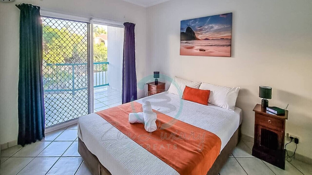 Cullen Bay Apartment | Zen City Balcony ~ Outdoor Dining ~ Mindal Markets
