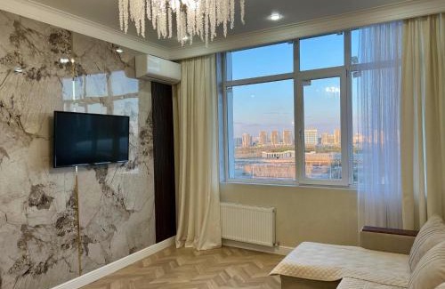 Yesil District Apartment | Вид на Ботанический сад и Астану Арену! Рядом Барыс Арена и Велотрек , мед объекты столицы!