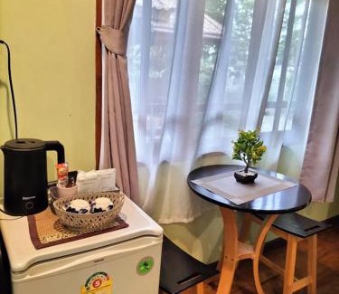Tha Bo House | บ้านพัก ญาวีร์ เฮาส์