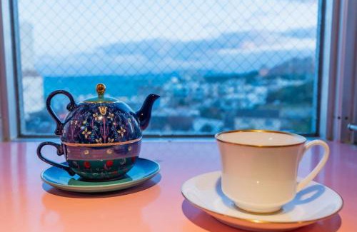 Maeganeku Apartment | シートピア恩納村 徒歩3分でビーチへ 6名宿泊可能 空港直通バス停目前で便利