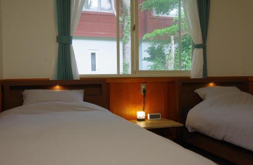 Minamiaso Bed & Breakfast | 個室ゲストハウスオルサみなみあそ