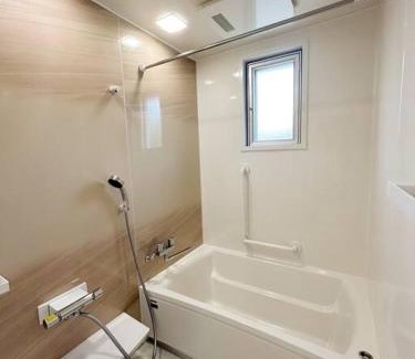Nago House | 北部観光アクセス良好な新築貸別荘／最大4名ベッド4台／Wi-Fi／海岸線近く