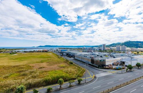 Yonabaru Apartment | 海の見える高層階グループファミリー歓迎コストコ近くthe琉球タワー7A