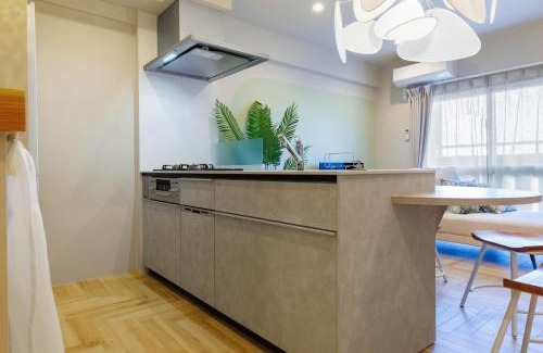 Yonabaru Apartment | 海の見える高層階グループファミリー歓迎コストコ近くthe琉球タワー7A