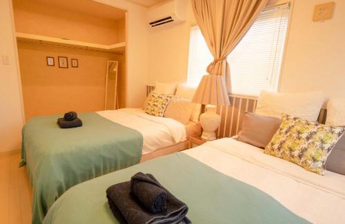 Uza House | 無料ビーチまで3分!BBQとホームシアターが楽しめるファミリー向け宿 Fujiyama Terrace