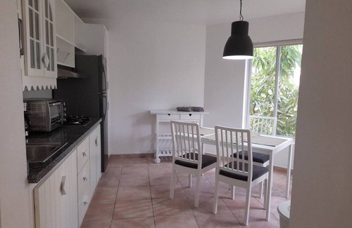 ProCab Apartment | 1-bedroom quiet condo in central Cabarete, TV/WiFi/pool/safe/parking