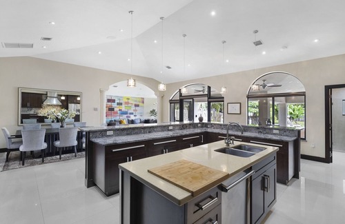 Riverside Park House | 144' New River Dock DT! Sailfish Pool, Hot Tub, Pontoon & Fire Lounge Luxury!