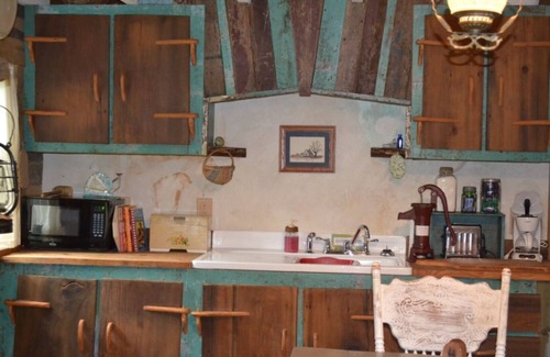 Madison Cabin | 1800’s restored log cabin on 26 private rolling wooded acres with sunset views