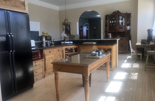 Clarkdale Apartment | 1917 Elegant Schoolhouse with Rose Gardens