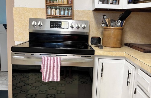 Clarksville House | 1920s farmhouse with a water view, and 6 miles to downtown Clarksville.