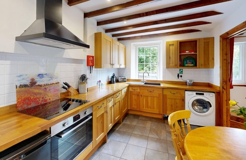 Margam Cottage | 19th century stable with four poster, river views and free WiFi