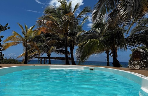 West End House | 2-bd sandy beachfront apt w/pool, cabana, hammocks, sunsets! a tropical dream!