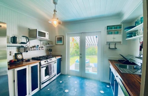 Mango Groves Cottage | 2 Bed/1 Bath Historic Cottage Near the Beach w/Pool-Bikes-WiFi-Cute & Cozy!