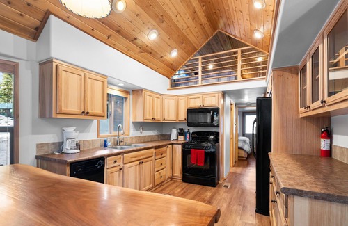 Historic Railroad District Cabin | 2 bedroom cabin, huge deck, lodge-style furnishings.
