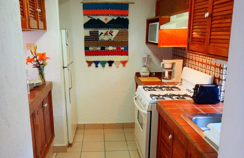 Colonia Andres Apartment | 2-bedroom Condo Vacation Rental. Clean and Safe. High Speed WiFi