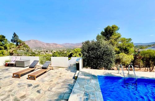 Palaia Fokaia Apartment | 2 bedroom self-contained apartment and swimming pool at Palm Tree Villa