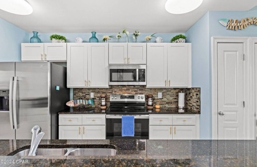 Waterside Village Condo | 2-bedroom waterfront condo with pool and hot tub in welcoming Mexico Beach
