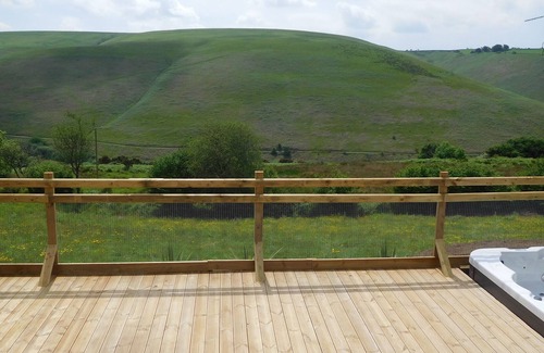 Bridgend House | 2 Log cabins with stunning views, ideal location near Cardiff, South Wales