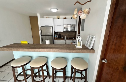 Guanajibo Condo | 20 steps from the beach! WiFi, fully airconditioned, gated community, sleeps 4