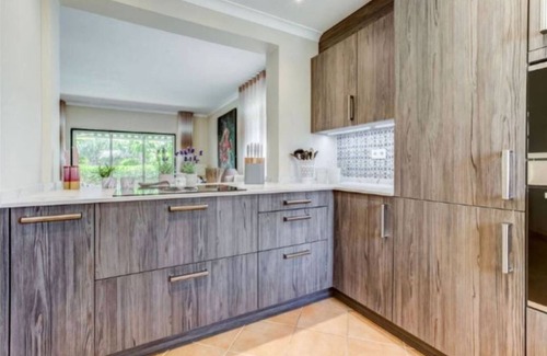 Estombar House | 2bedroom 2en suite Bungalow private Terrace and garden Gas BBQ shared pool