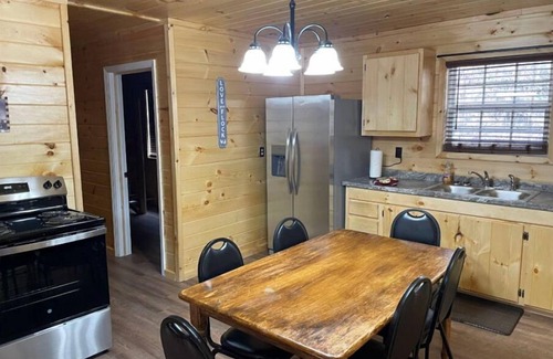 Lejunior Cabin | 2BR 1 Bath cabin w/full kitchen, hot tub, and living room.