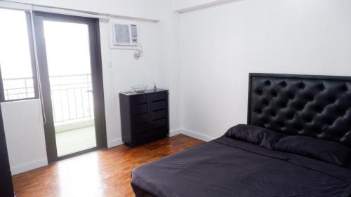 Ususan Apartment | 2BR near BGC & Makati. Karaoke, Netflix, Amazon Prime