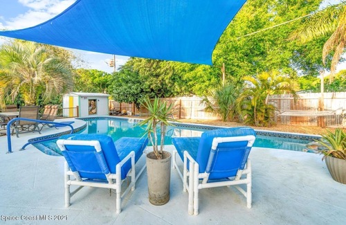 Cocoa House | 3 bed/2 bath house with tropical backyard, pool, fenced yard, hammock
