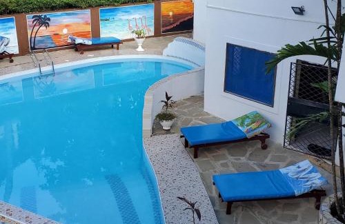 Galu Beach Villa | 3 Bed Villa - Sleeps 6 - Wifi - Parking