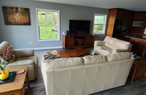 Delton House | 3 bedroom home on a peaceful private no wake lake. With kayaks and floating deck