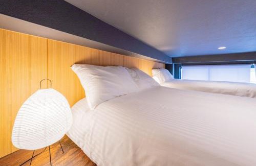 Higashishinsaibashi Apartment | 4階 ホテル福 道頓堀に位置する宿 ベッド9台 シャワー2台 観光に最適