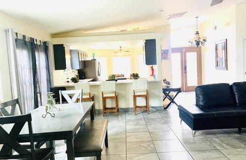 North Las Vegas Villa | 4 bedrooms house. Sleeps 14, 13 miles to Airport, 7-11 miles to the Strip.