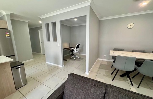 Coomera House | 4-BR Home close to beaches and attractions. Includes access to a pool, spa, gym