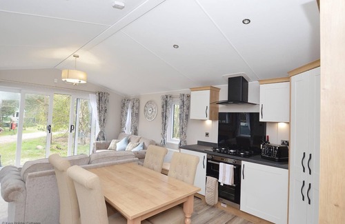 Weybourne Cottage | 476 Kelling Heath - a holiday caravan that sleeps 4 guests in 2 bedrooms