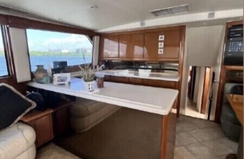 Tampa Boat Rental | 48’ Hattaras Sport Yacht onTreasure Island inter coastal near johns pass village
