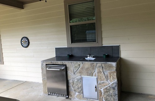 Avinger House | 5-Bedroom Open Concept Home nestled among the Pine Trees on a quiet road.