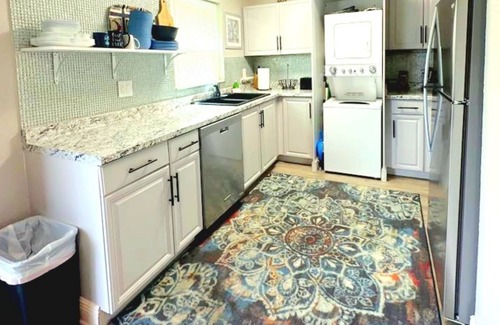 Anona Condo | 5 Min>Beach Remodeled 2 bed 2 Bath Condo With Pool and Grill and King bed!